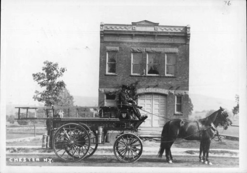 Frank Green, Alfred Thompson and ? leaving Walton Hose Co. Fire House for the 1914 Parade in Middletown, NY. chs-000120